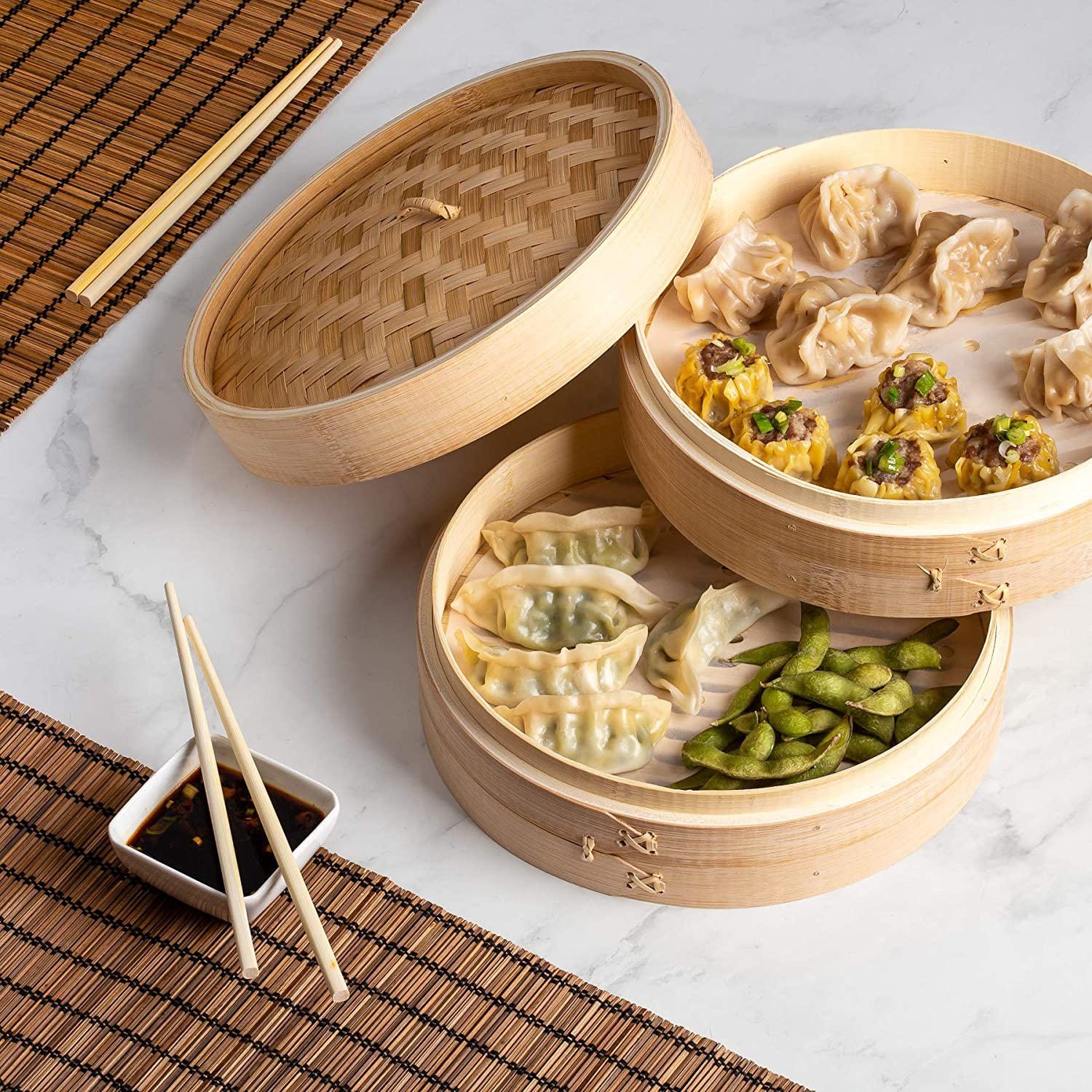  Bamboo Steamer Basket 10 Inch Or 12 inch- Dumpling Maker, Vegetable Steamer- 2 Sets of Chopsticks, 1 Sauce Dish & 50 Liners 